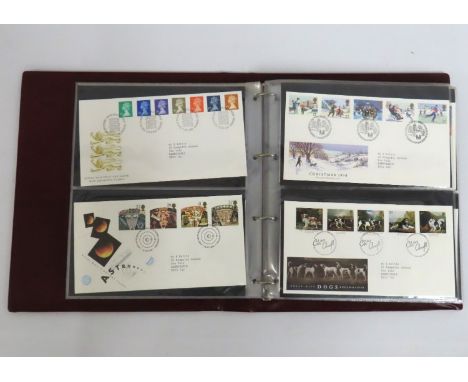 A Royal Mail album of first day covers, approx. 72, 1980's & 1990's with one coin cover