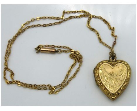 A 9ct gold chain set with '9ct gold back & front' locket, chain weight 1.2g, chain length 410mm, locket drop 22mm