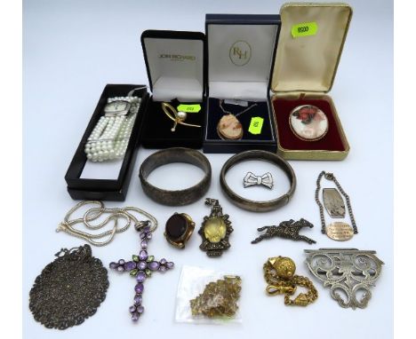 A yellow metal mounted porcelain portrait brooch, two silver bangles, 43.5g, a silver amethyst & peridot cross & chain, a whi