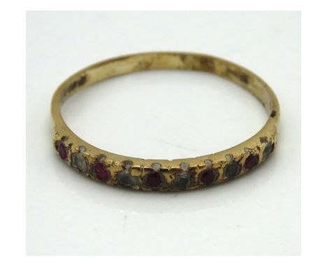 A 9ct gold half eternity ring set with ruby & white stones which have abrasions, 1.4g, size R