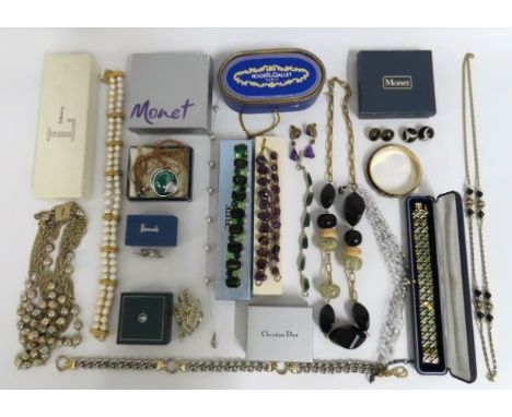 A quantity of costume jewellery including Monet, Christian Dior, Roger Gallet, Liberty, Jaegar & Harrods 