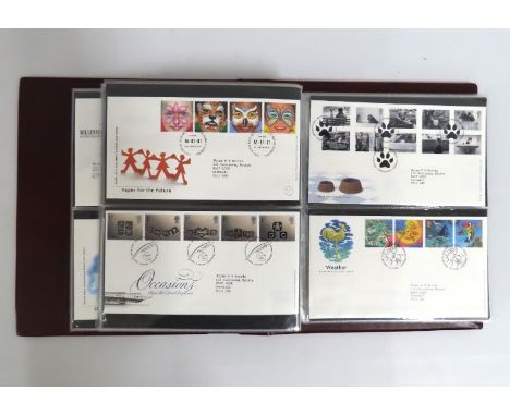 A Royal Mail album of first day covers, approx. 88, 1990's inc. two coin covers