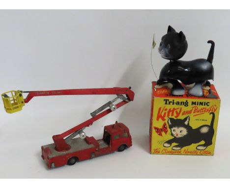 A vintage boxed Tring Minic clockwork Kitty cat with butterfly twinned with a Corgi Major Simon Snorkel fire engine
