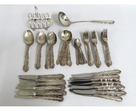 A quantity of silver plated cutlery, a matching ladle & a plated toast rack