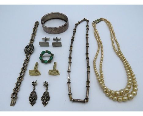 A 1934 Birmingham silver bangle, lacking safety chain & other silver & white metal items including a bracelet & necklace