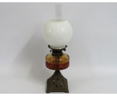 A Young's oil lamp with amber well & opaline shade, 545mm 