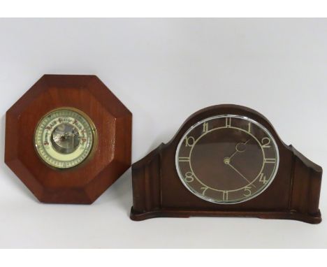 A mounted barometer with enamelled dial & mid 20thC. mantle clock, 300mm wide
