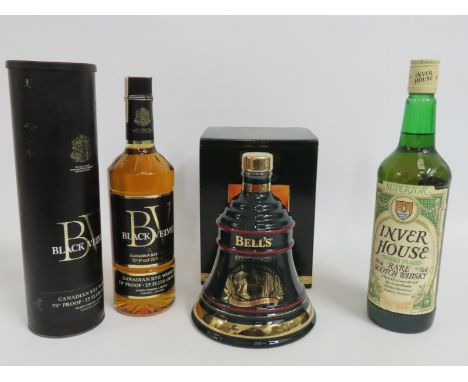 A boxed Bells Christmas 1995 Extra Special Old Scotch blended whisky, a Black Velvet Canadian Rye whisky & a Inver House Gree