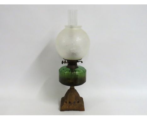 A Duplex oil lamp with green well & etched shade, 585mm
