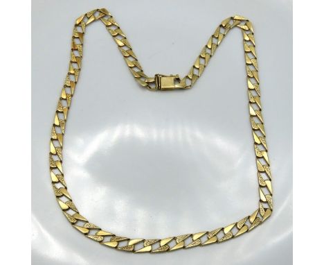 A 14ct gold curb link chain, 520mm long, 30.4g