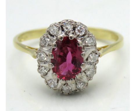 An 18ct gold ruby & diamond ring, ring head 12mm x 9.5mm, 3g, size M