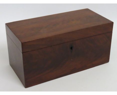 A 19thC. mahogany tea caddy with glass sugar bowl, fault to one of tea compartments, 310mm wide x 150mm high x 150mm deep 