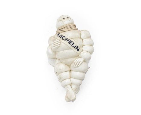 An Illuminated Michelin Man Advertising Figure, seated on a metal mounted bracket fitted with two-core cable (untested), 47cm