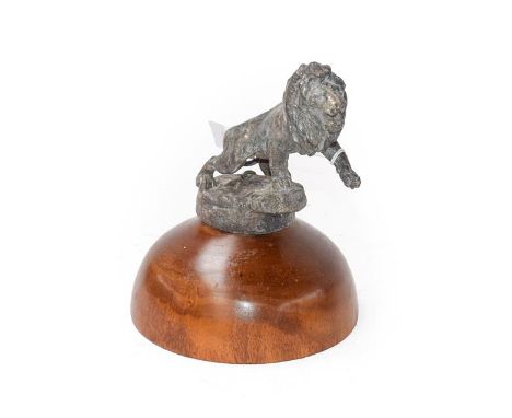 Morris Marx: A 1920's Brass and Silver Plated Peugeot Car Mascot, as a lion standing on a base, mounted on a later circular w