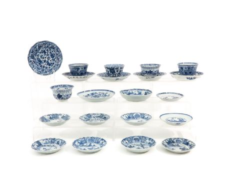 Including cups and sauers in a variety of blue and white decors, some 18th Century, largest saucer is 13 cm. in diameter, in 