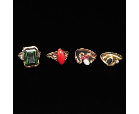 Set with opal, red coral, diamonds, and sapphires, ring sizes are 15 - 16.