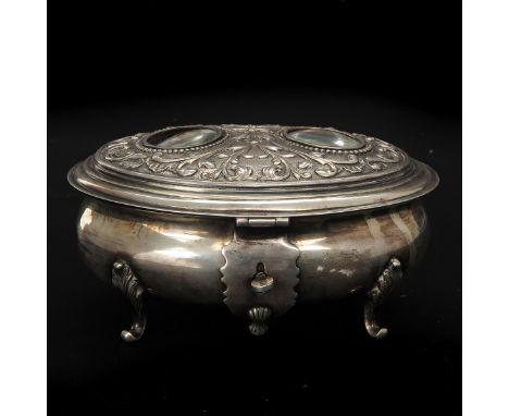 Cover is set with 2 portrait medallions, 14 cm. long.