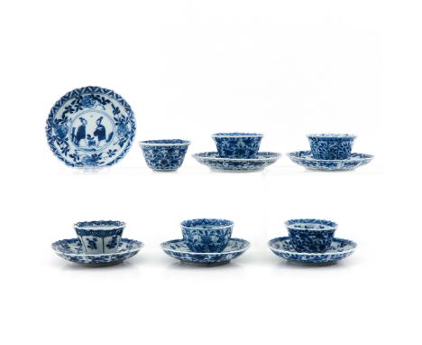 Including 6 cups and 6 saucers with floral decor and Chinese figures, saucers are 11 cm. in diameter.