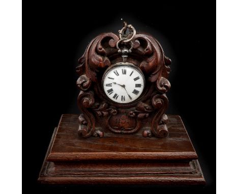 19 cm. tall, case is 53 mm. in diameter, with chain.