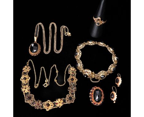 Set with garnet, including 2 necklaces, bracelet, ring, brooch, and earrings.