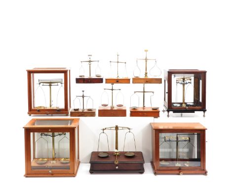 Including Philip Harris, some in glass vitrines, tallest scale is 44 cm. This lot will not be shipped.