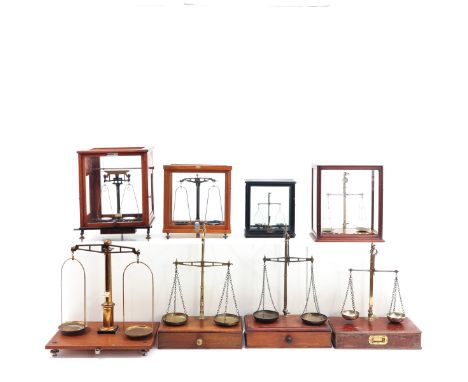 Including Oertling, some in glass vitrines, tallest scale is 58 cm.  This lot will not be shipped.