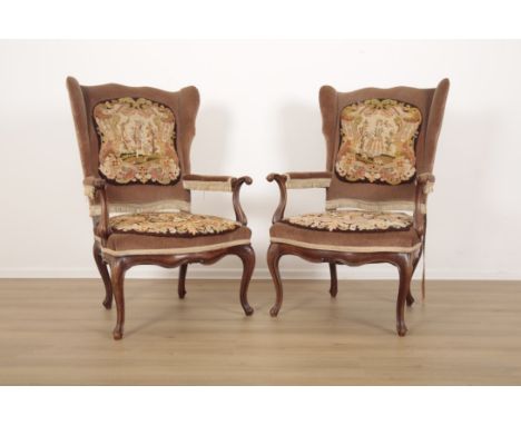 A PAIR OF LOIUS XV STYLE BEECHWOOD ARMCHAIRS covered with velvet and tapestry panels, the panels to the seat backs depicting 