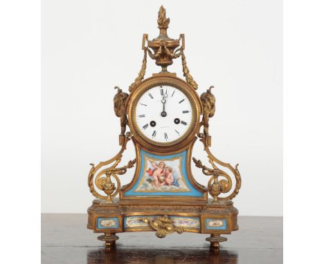 A VICTORIAN GILT METAL MANTEL CLOCK BY JOHN HALL &amp; CO OF MANCHESTER the two train movement striking on a bell, the enamel