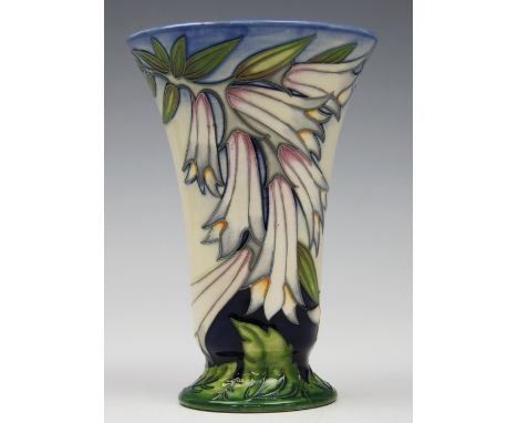 A Moorcroft trial vase, circa 2004, of bell form with spreading foot, decorated with white bell type flowers against a washed