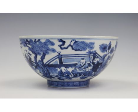 A Chinese blue and white bowl, Jiaqing seal mark, externally decorated with multiple boys within a landscaped setting, the pe