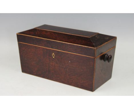 An early 19th century plumb pudding mahogany tea caddy, sarcophagus shaped with later handles, 15.5cm H x 30cm W