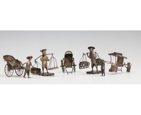 A selection of Chinese silver figural miniatures to include a sedan chair, two rickshaws and two yoke carrying fishermen (5)