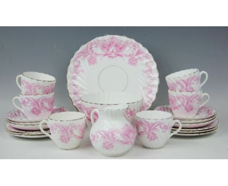 A Victorian Shelley type tea service comprising; six teacups and saucer, six plates, a sugar bowl, milk jug and serving plate