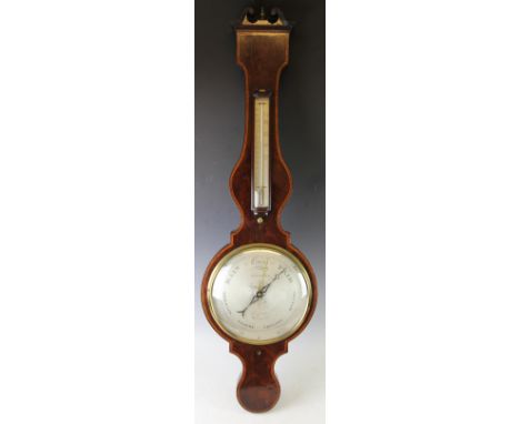 An early 19th century inlaid mahogany wheel barometer, with mercury barometer above a silvered dial signed A. Alberte Sheffie