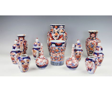 A selection of Japanese Imari decorated wares, to include a high shouldered vase, 27cm high, two baluster vases, 22.5cm high 