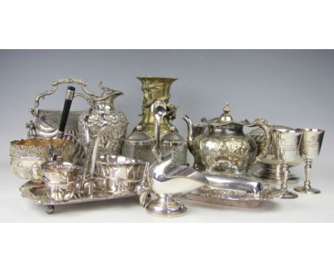 A selection of silver plated wares to include a heavily embossed pitcher, Sturges Bladon & Middleton, with vacant cartouche a