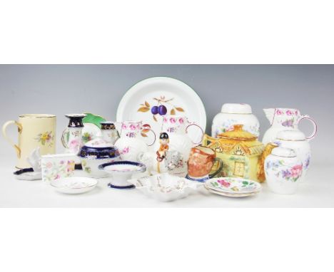 A collection of decorative ceramics to include a set of three graduating Coalport Caughley mask-head jugs, a set of three gra