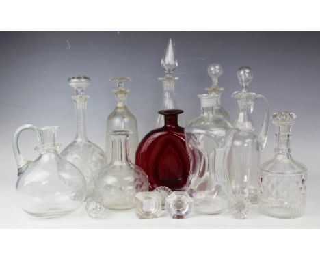 An assortment of ten Georgian and later glass decanters and various stoppers, to include a tapering decanter initialled HH in