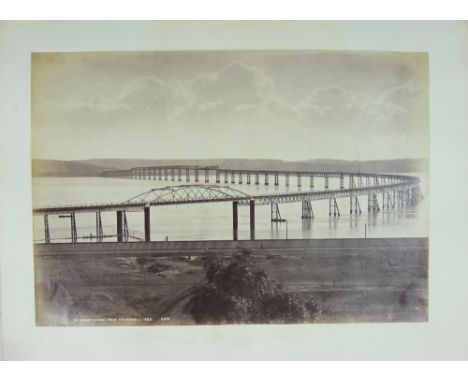 A late Victorian photograph album, with many mounted photographs and photographic prints of views and architectural scenes in