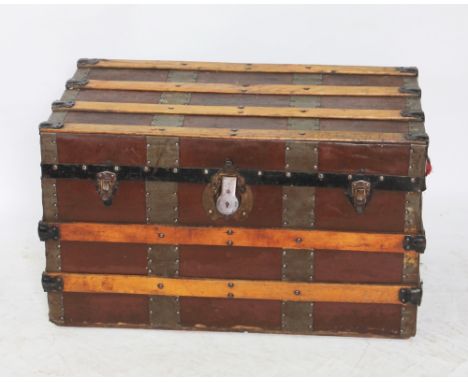 A later Victorian vintage travelling trunk, ash and canvas mounted wood with paper lined interior, 43cm H x 86cm W x 46cm D