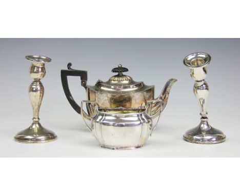 A silver batchelors teapot, Arthur Cook, Birmingham 1903, of oval half reeded form, with ebonised handle and finial, 9ozt gro