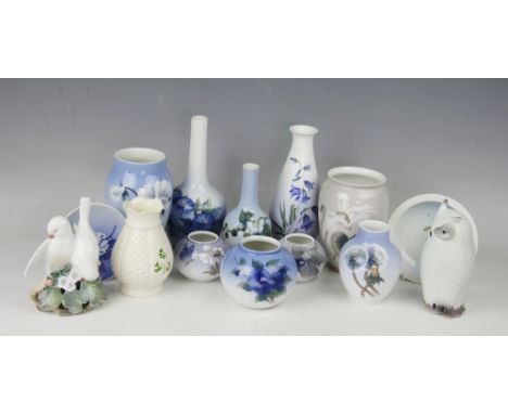 A collection of Royal Copenhagen, to include; nine florally decorated vases, of varying sizes, along with two pin dishes, an 