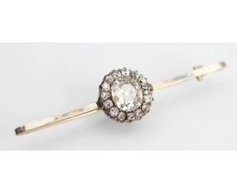 A diamond cluster set brooch (probably converted from a 19th century ring), the central cluster formed as a central, oval, ol