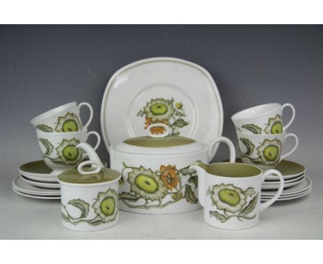 A Susie Cooper tea service decorated in the Sunflower pattern, comprising teapot and cover, milk jug, sugar bowl and cover, s