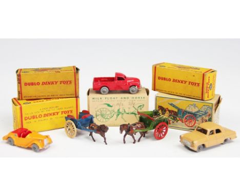 Two Britains Lilliput World models, Milk Float with horse No LV/605 and milk float with cart, No LV/606; with three Dinky die