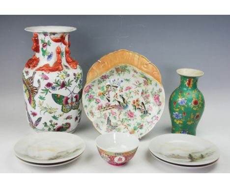 A selection of oriental wares to include a Chinese Canton famille rose plate, of mask design, 28cm wide, a Chinese vase famil