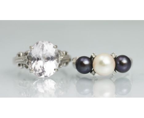 A grey and white pearl and diamond set ring, all set in white gold, and a kunzite set ring also in 9ct white gold, gross weig