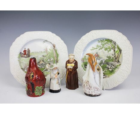 Two Royal Worcester candle snuffers, one modelled as a monk the other an a nun, with a Bloor China Stoke on Trent stirrup cup