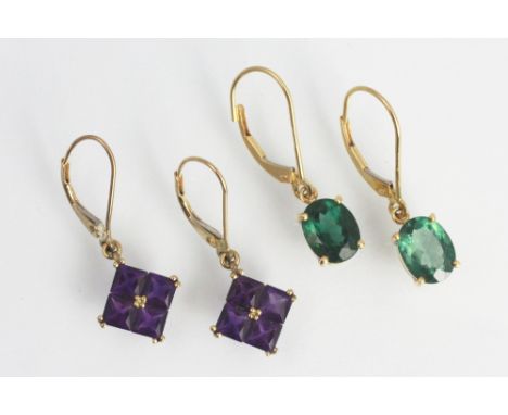 A pair of amethyst set drop earrings, each designed as a square panel set with four amethysts in yellow metal stamped '9k', a