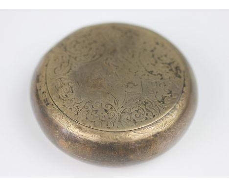 An Edwardian silver snuff box, George Unite, Chester 1903, of circular form, with profuse chasing and central monograme, with